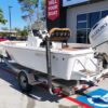 2020 Sea Pro 208 Bay with Suzuki outboard motor on a dual-axle trailer.