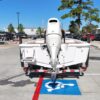 2020 Sea Pro 208 Bay boat with outboard motor on trailer.